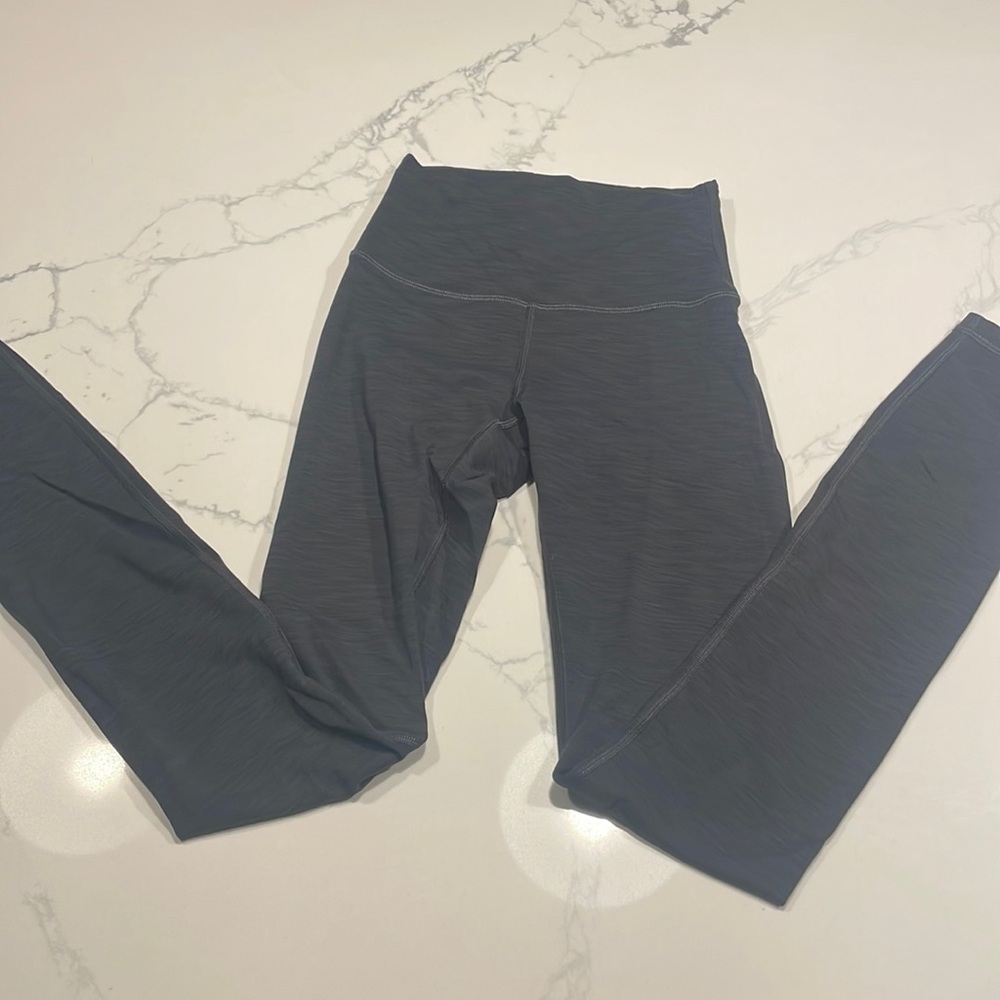 Wunder Train High rise tight. Size 2. Hem’d to 28 in.
